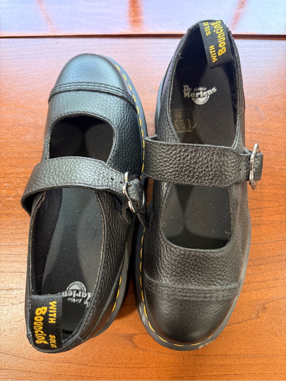 Dr. Martens Black Mary Jane Shoes with Yellow Welt Stitching